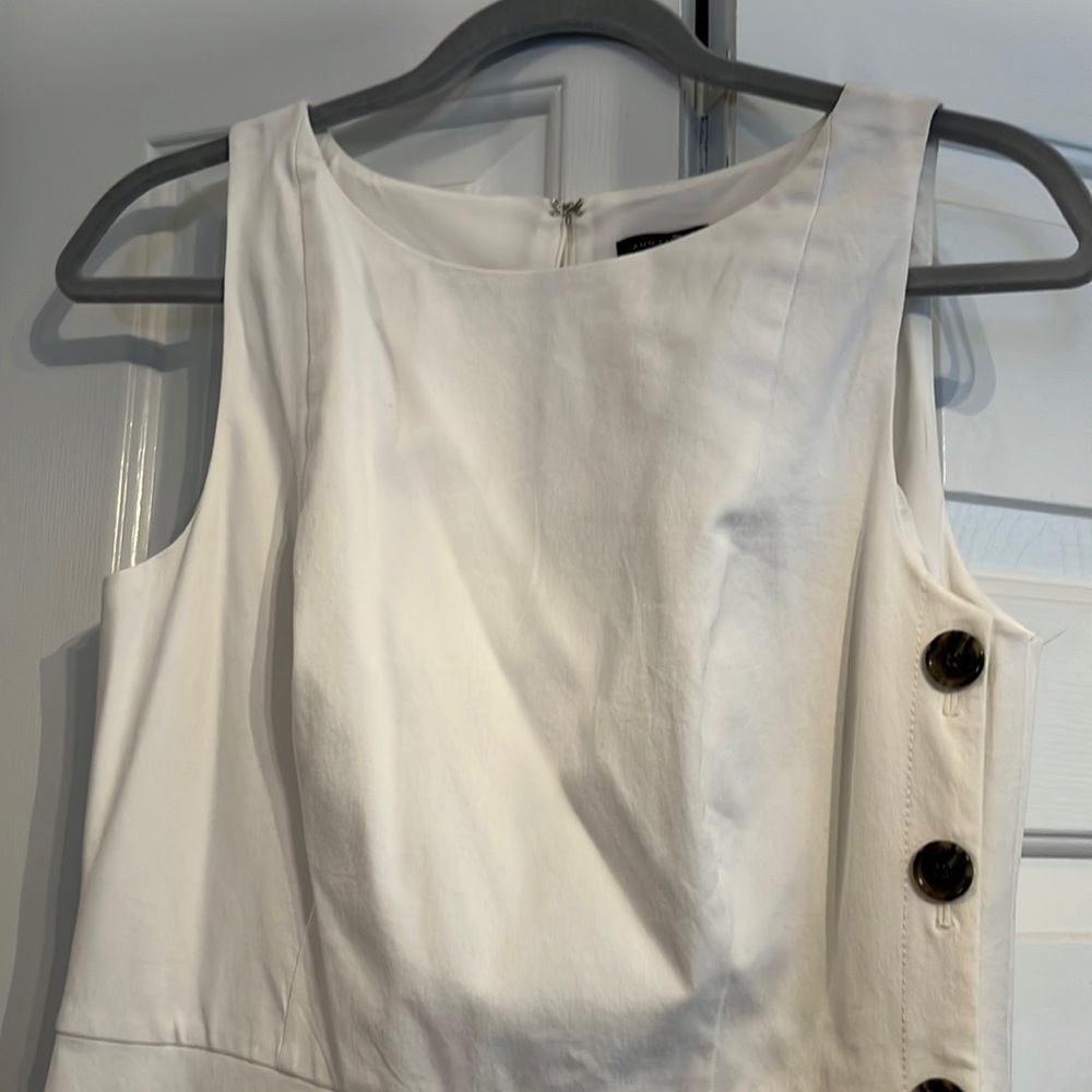 White Ann Taylor midi dress, decorative buttons down length of left side.